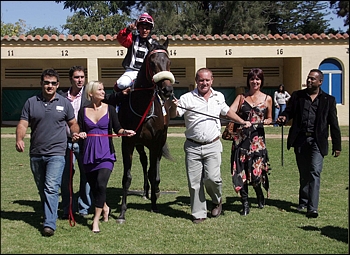 Night Club, by Carpocrates being led in by owners Messrs P L Lunn, Sagren Govender, L P Lunn, K Ramruthan, P C Bentley and Miss K J Bentley. Image: Gold Circle