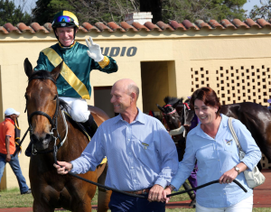 Well In Flight lead in by breeders and part owners Bruce and Delia Le Roux. Image: Gold Circle